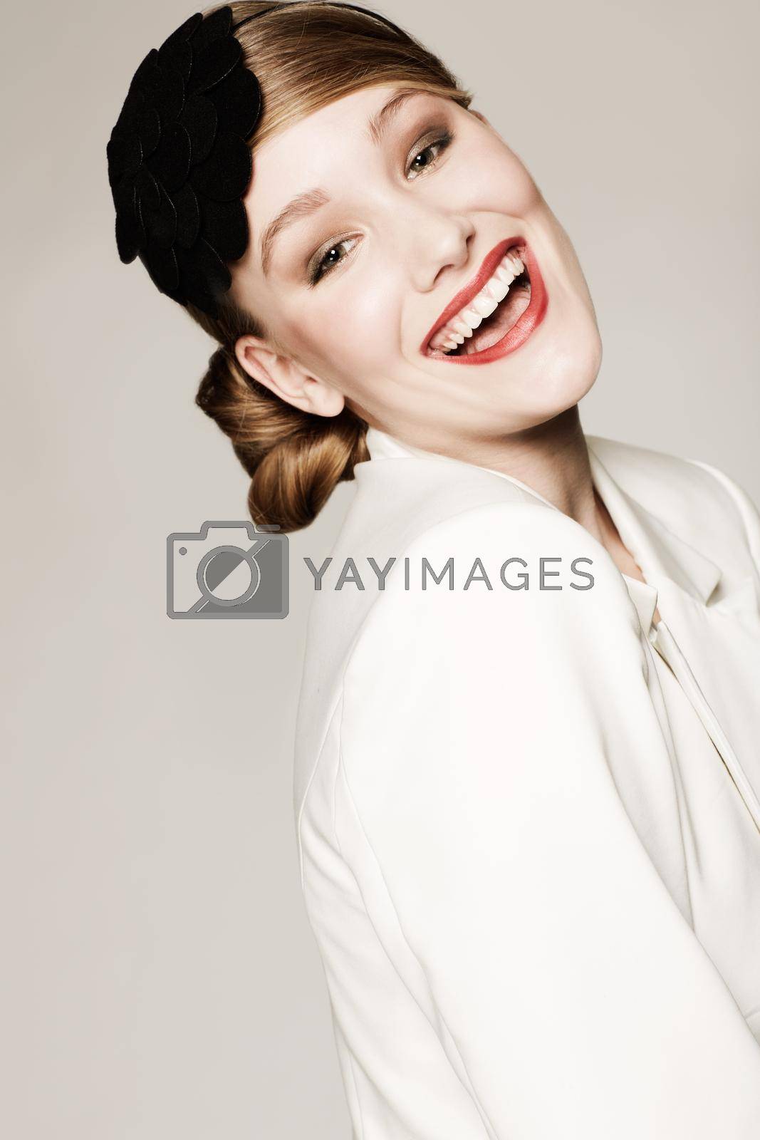 Royalty free image of Happy to be stylish. A gorgeous young woman in elegant clothes. by YuriArcurs
