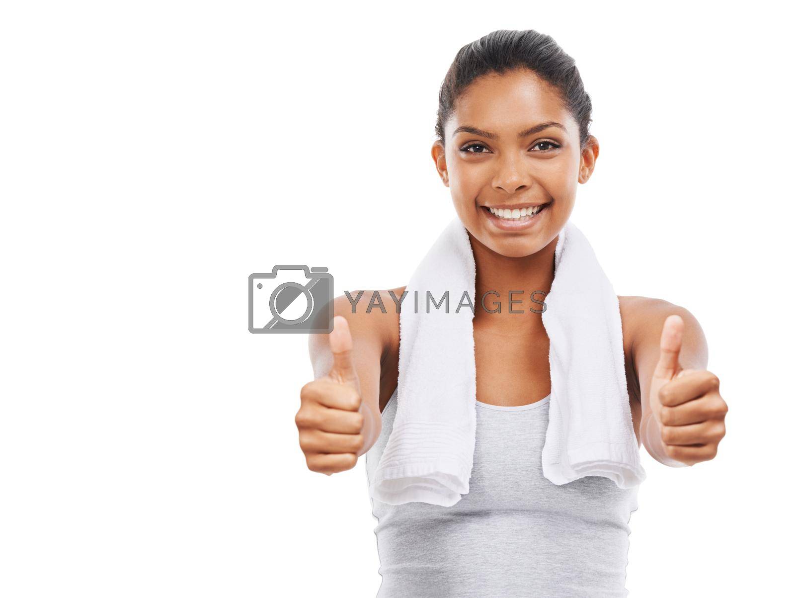 Royalty free image of You did great today. A gorgeous young woman in sportswear giving you the thumbs up. by YuriArcurs