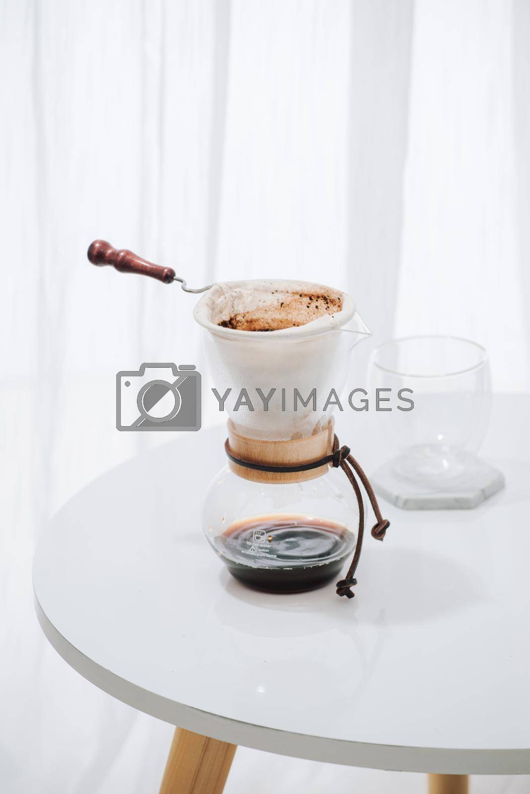 Royalty free image of Coffee drip set, Making coffee dripping in coffee shop by makidotvn