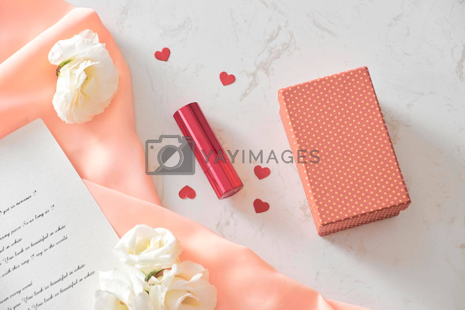 Royalty free image of Happy Valentine's Day concept on vintage paper sheet with lipstick by makidotvn