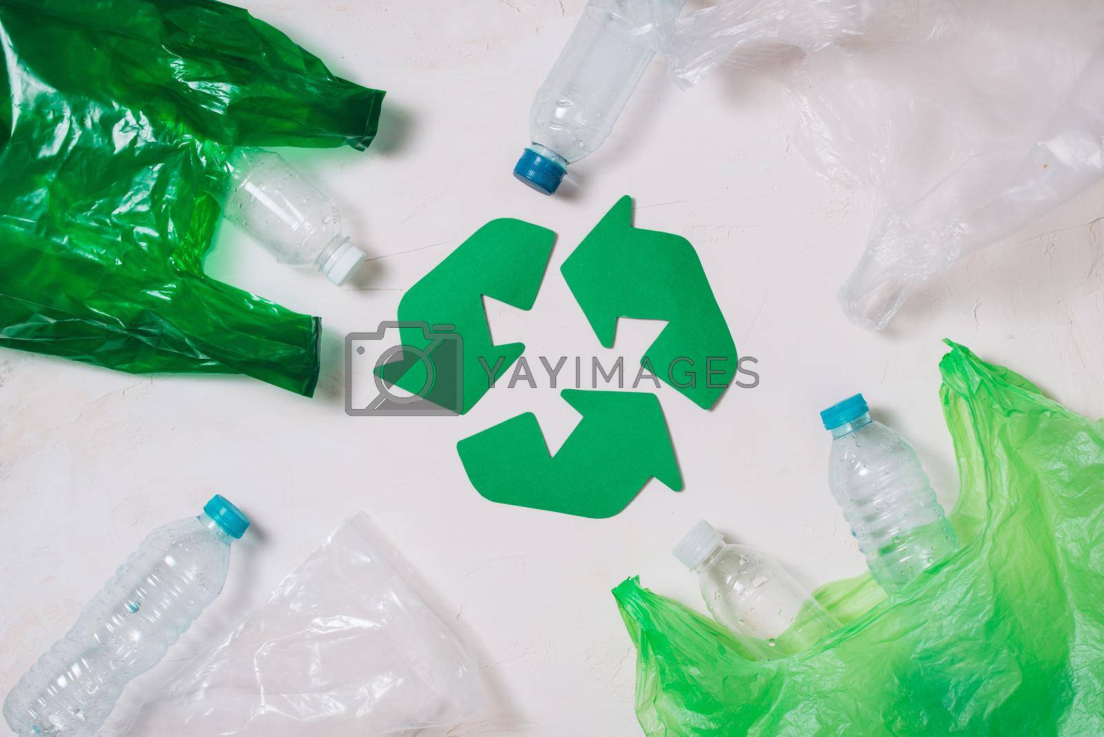 Royalty free image of Eco concept with recycling symbol on table background top view by makidotvn