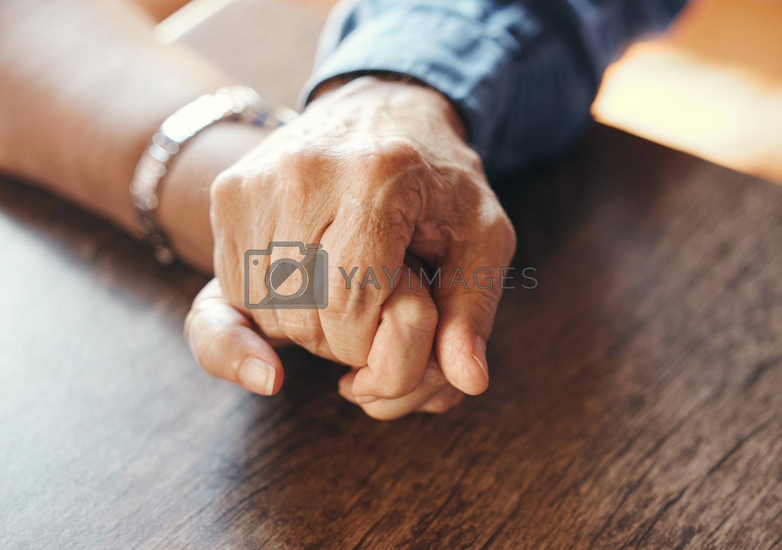 Marriage senior couple holding hands in for support, mental health and care after bad news, results or sick. Love, trust and help with retirement people for depression, family or healthcare problem.