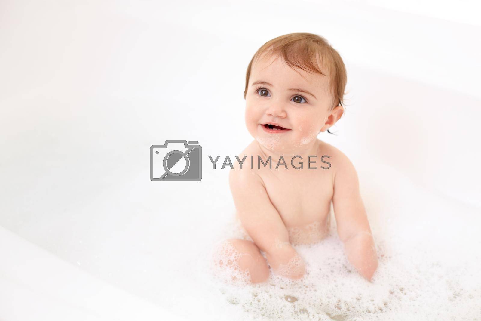 Royalty free image of Its easy to get this baby in the bathtub. A cute baby girl in the bathtub. by YuriArcurs
