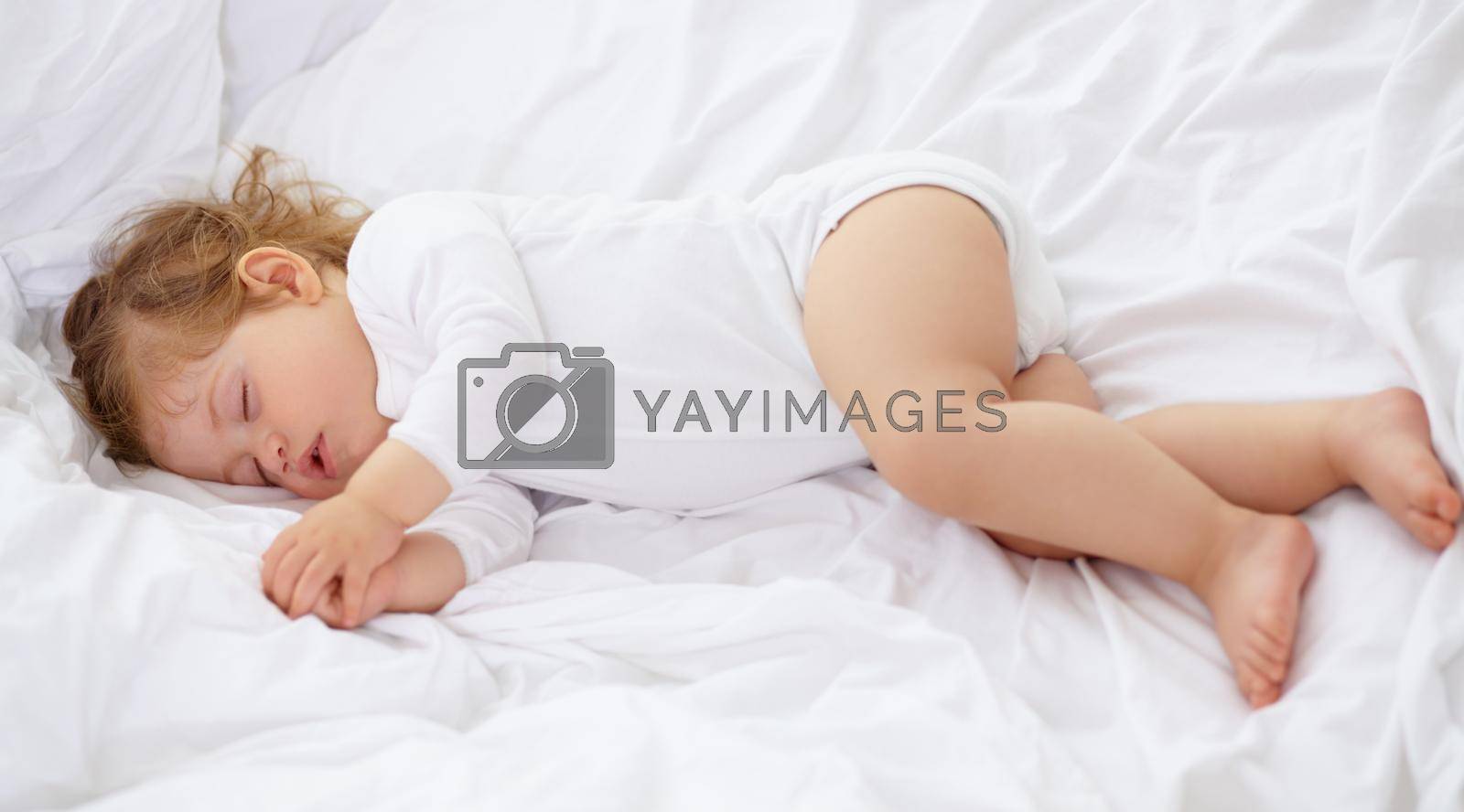 Babies need a lot of sleep. An adorable baby sleeping in the bedroom