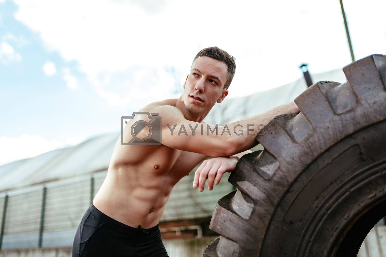 Royalty free image of Exercising With Tyre  by MilanMarkovic78