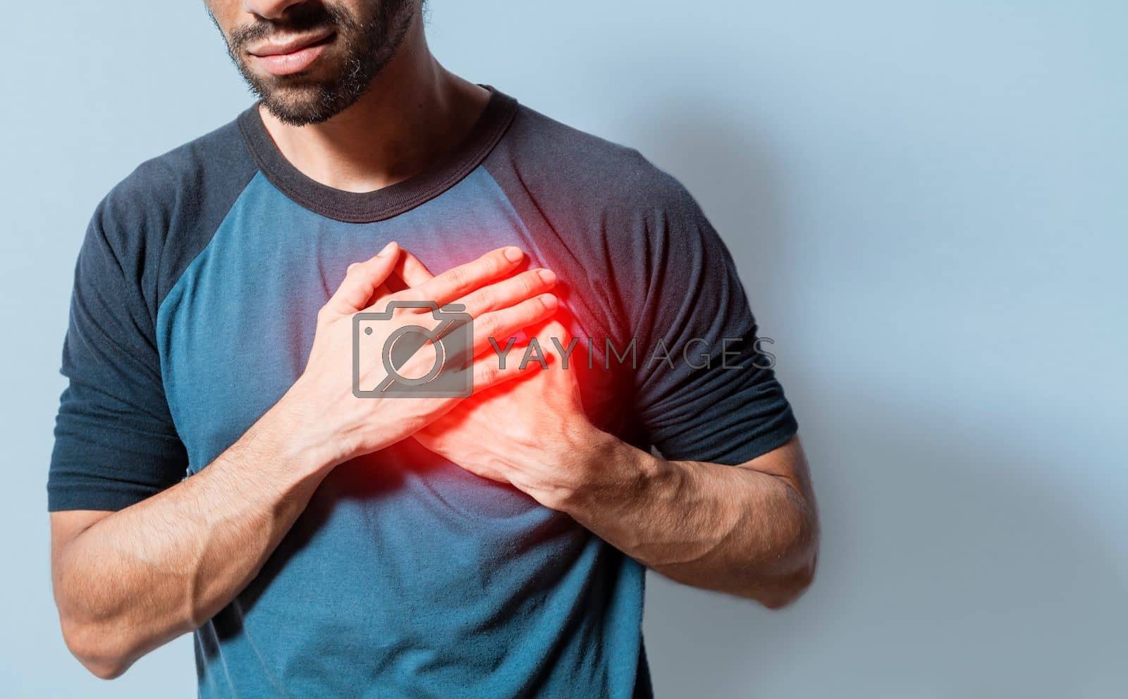 Royalty free image of People with chest pain isolated, young man with tachycardia, man with heart pain on isolated background, young man with heart pain. Concept of people with heart problems by isaiphoto