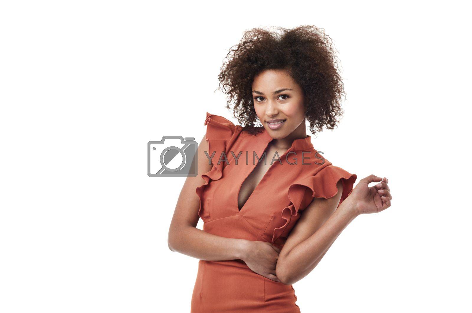 Royalty free image of Sassy and cool. A gorgeous ethnic woman with a sassy attitude smiling at the camera. by YuriArcurs