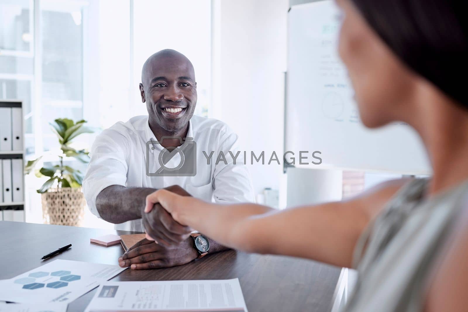 Royalty free image of Handshake, partnership and black man with black woman in business meeting in city office. Collaboration, thank you and business people shaking hands for contract agreement, business deal and project by YuriArcurs