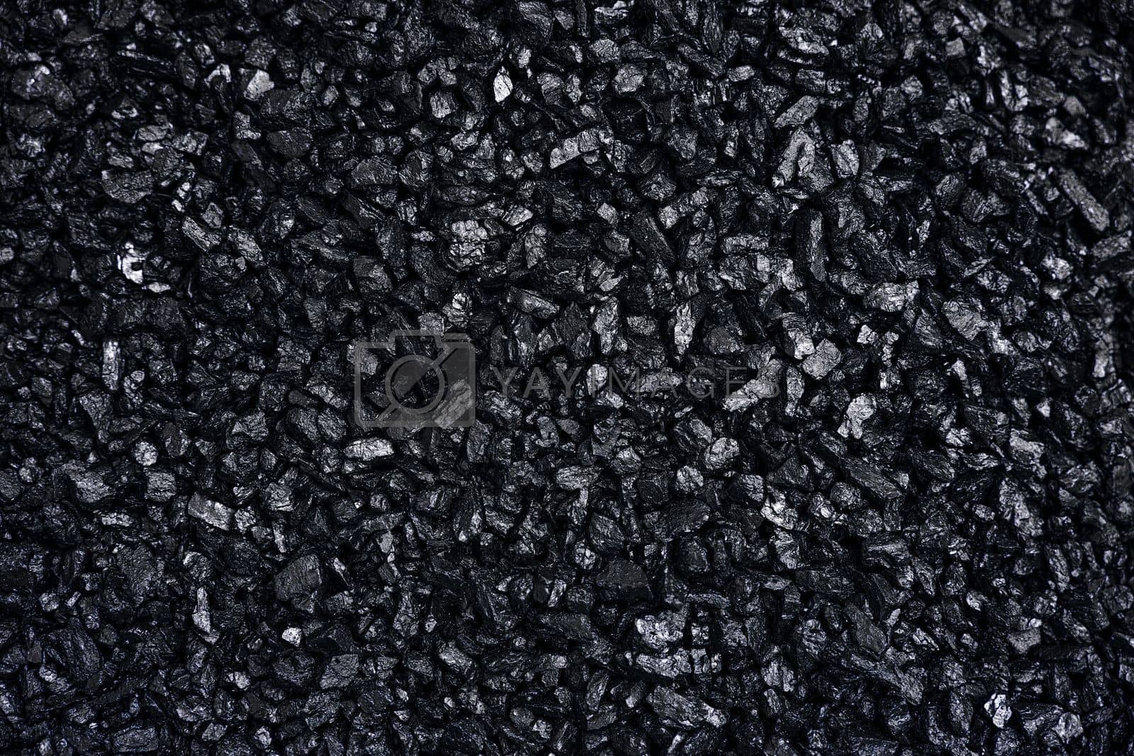 Royalty free image of Fuel for furnace heating - hard coal. Pile of natural black hard coal for texture background. Best grade of metallurgical anthracite coals often referred to as stone coal and black diamond coal by EvgeniyQW