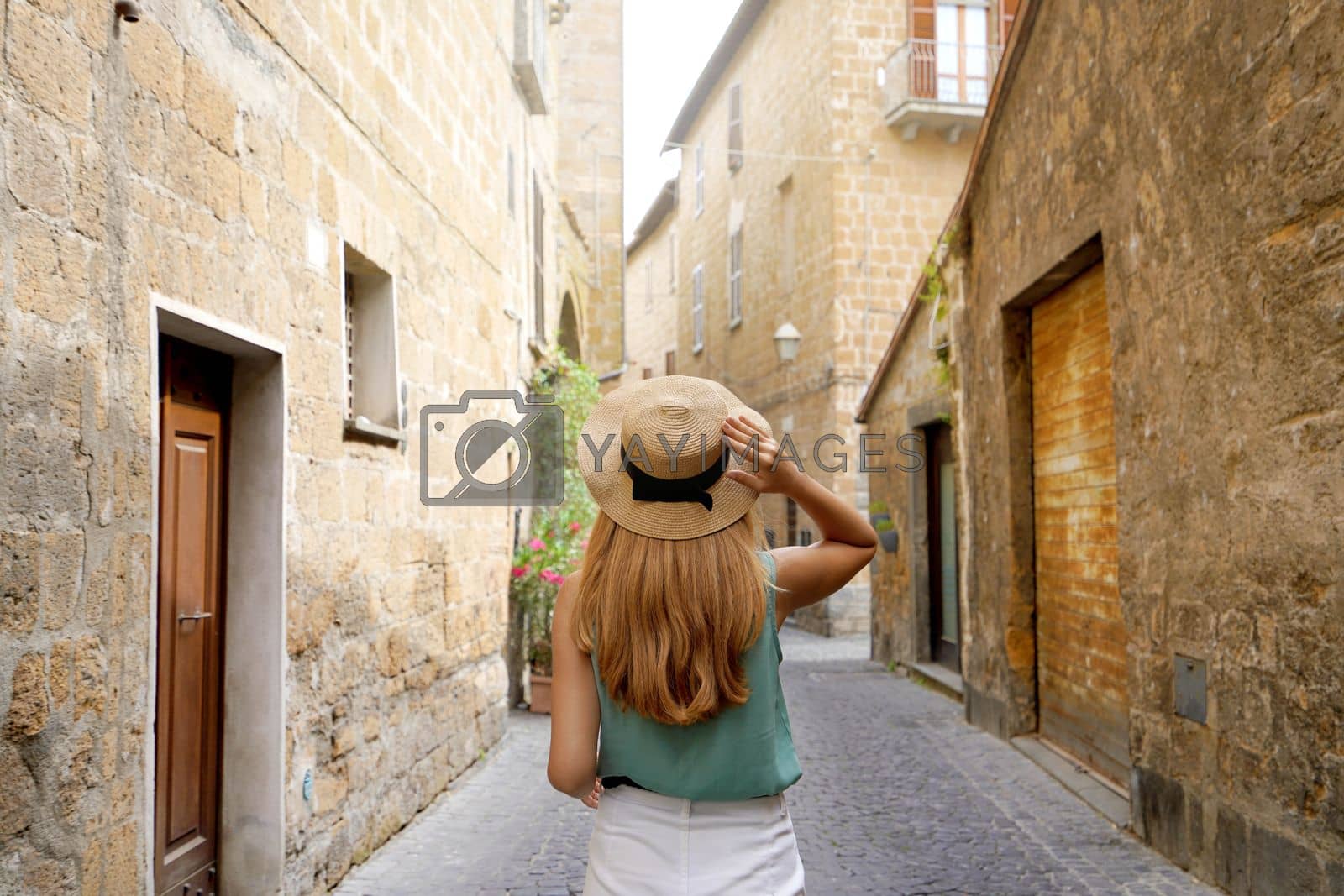 Royalty free image of Holidays in Italy. Young woman visiting historic medieval town of Orvieto, Umbria, Italy. by sergio_monti