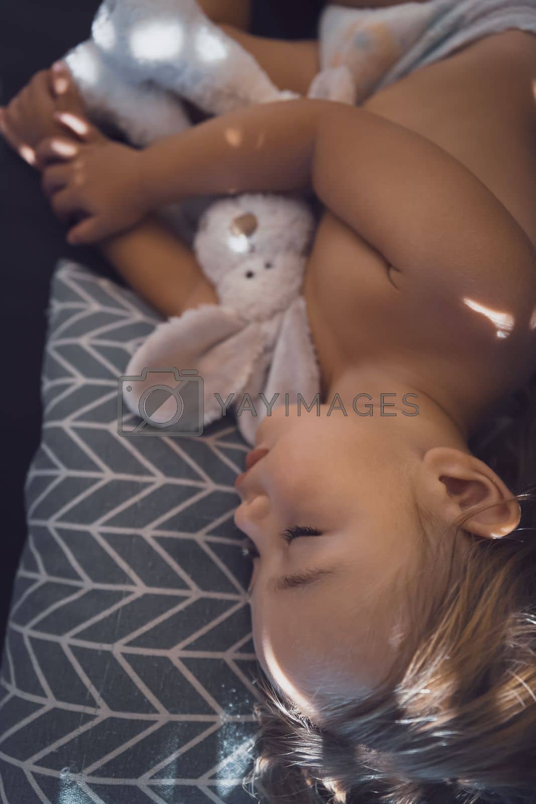 Royalty free image of Beautiful baby sleeping at home by Anna_Omelchenko