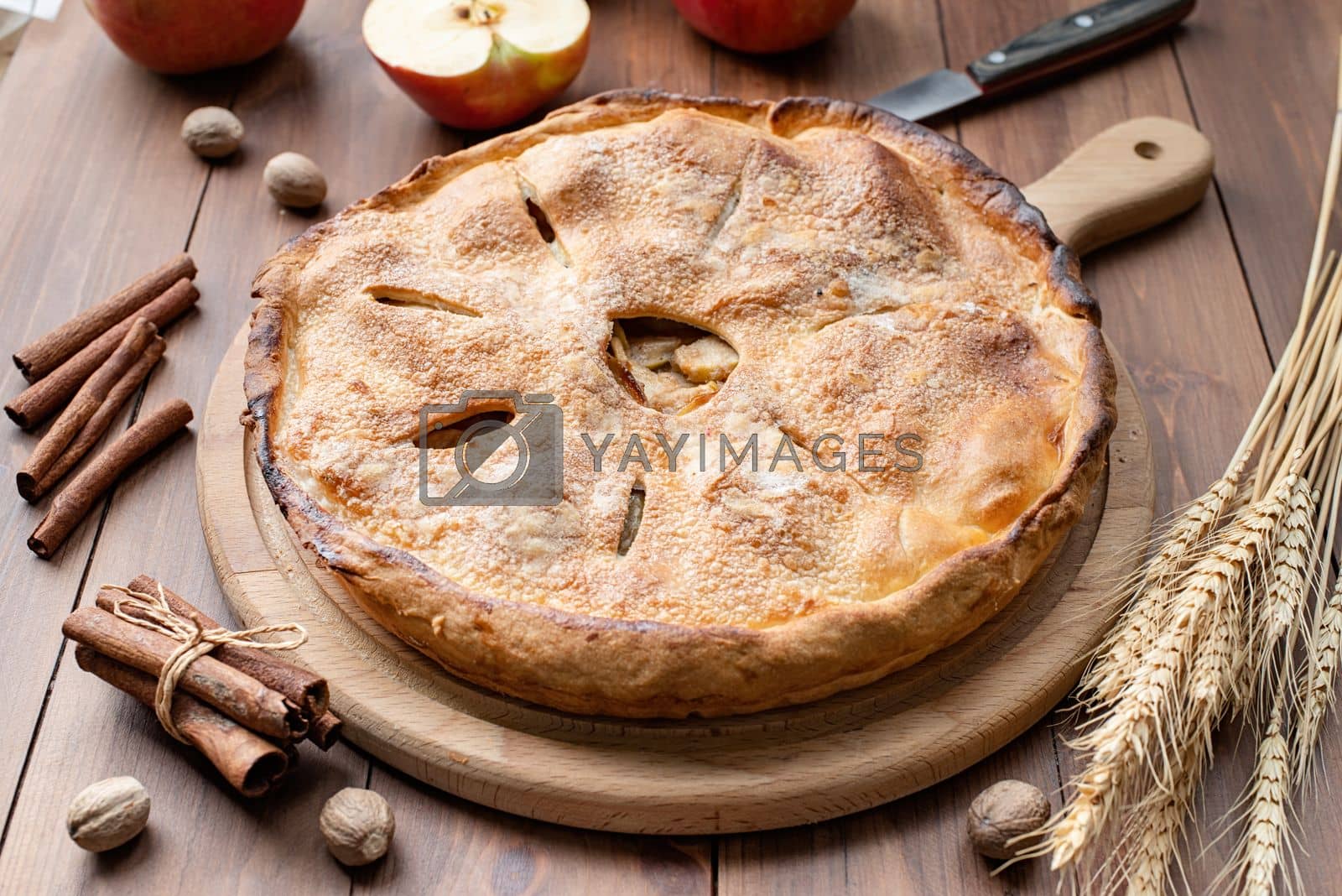 Royalty free image of apple pie served with sugar powder by Desperada