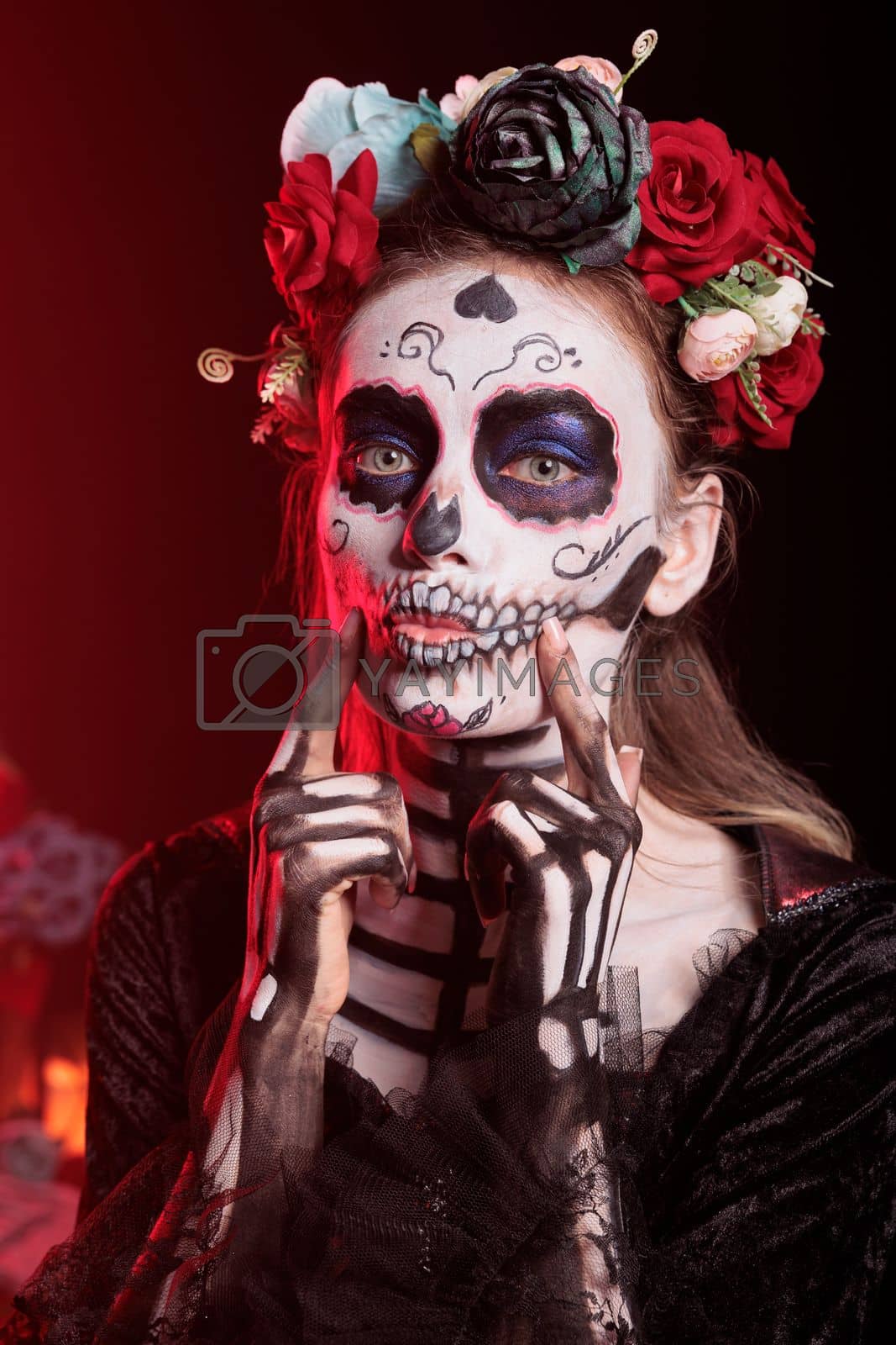 Royalty free image of Spooky lady of death doing flirty kissy face by DCStudio