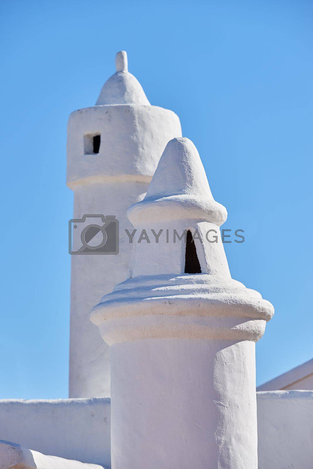 Royalty free image of Colahonda - the beautiful coastal city of Andalusia, Spain. Beautiful chimneys and ventilation tubes in the city of Colahonda, Andalusia, Spain. by YuriArcurs