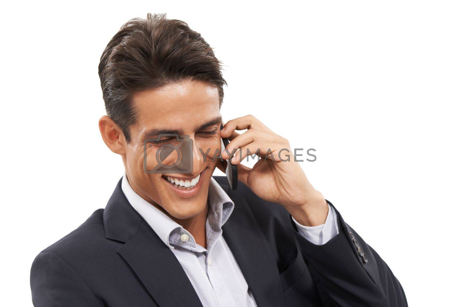 Royalty free image of Communication is the key to success in any business. A handsome young businessman making a call on his mobile. by YuriArcurs