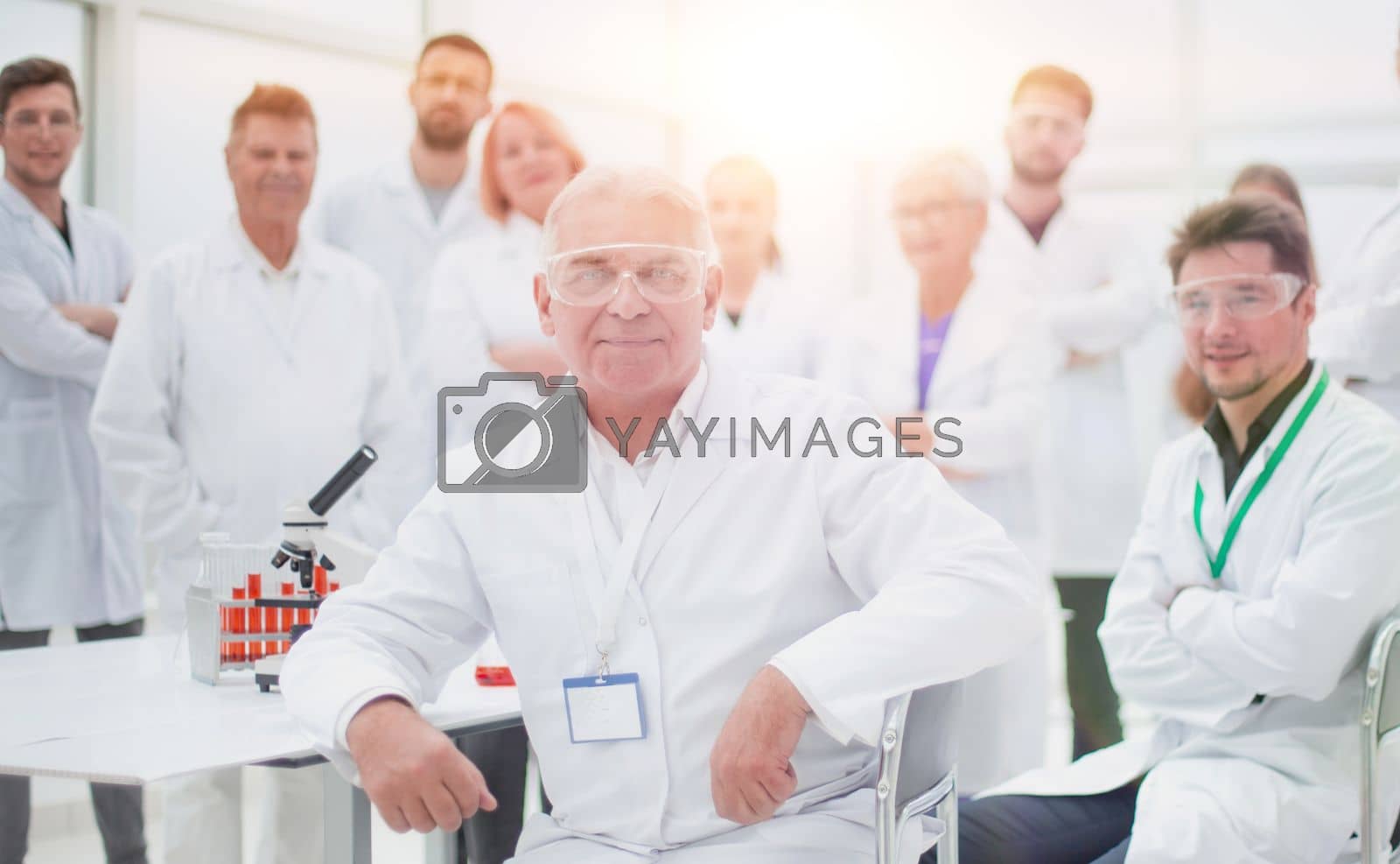 Royalty free image of tight-knit group of scientific laboratories in the workplace. by asdf