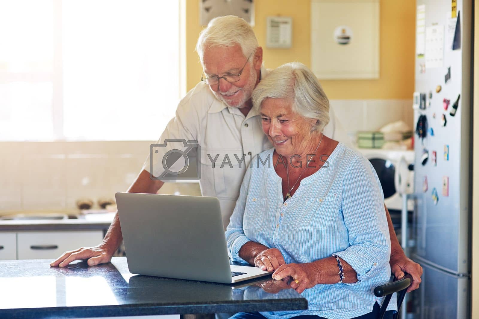 Royalty free image of Technology has changed their lives for the better. a senior couple using a laptop together at home. by YuriArcurs