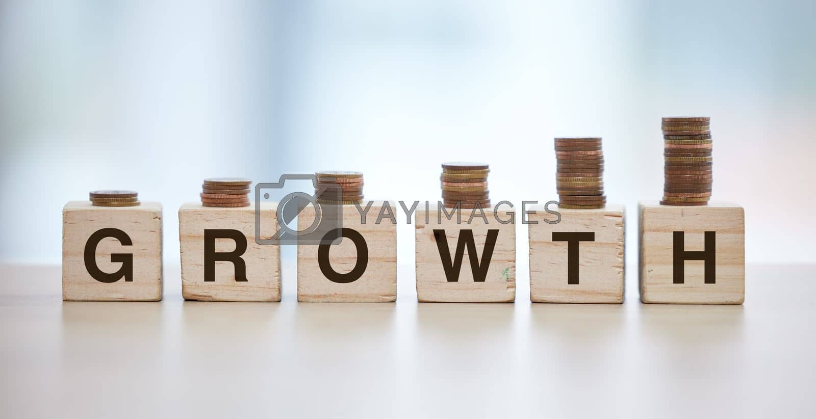 Royalty free image of Money, finance growth and coin on blocks for increase in savings, budget and investment for economy. Financial planning, success and cash stack for growing salary, banking account and stock market by YuriArcurs
