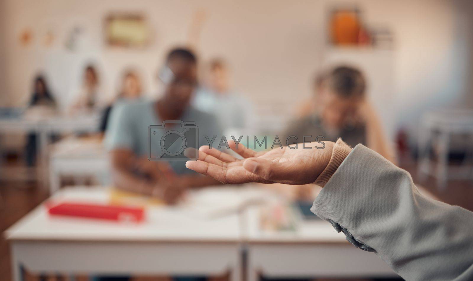 Hand, education and study with a teacher and students in a classroom for a lesson on growth or development. University, learning and higher education with an educator explaining a theory in a class.