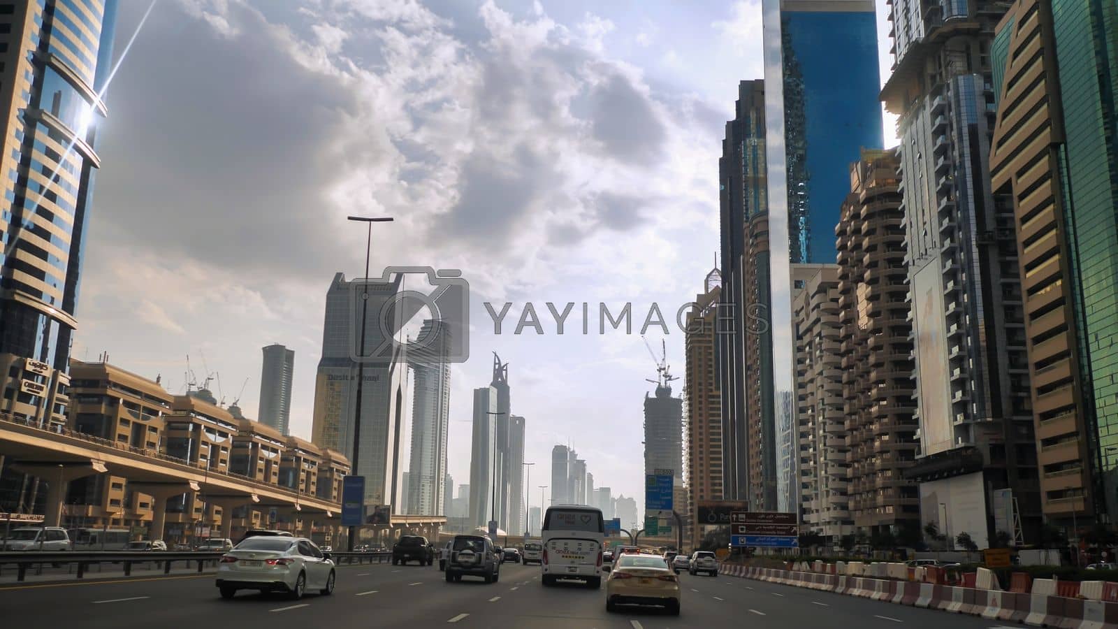 Royalty free image of Dubai, UAE - December 14, 2019: Drive along Sheikh Zayed Road in Dubai. by DovidPro