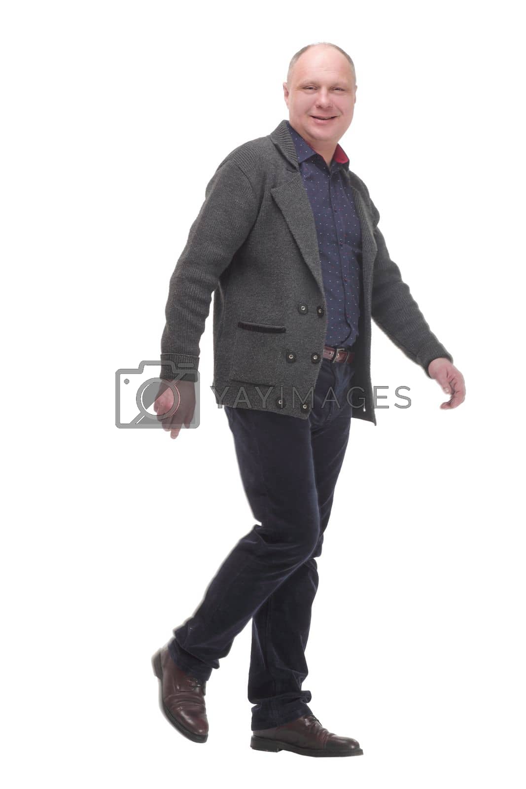 Royalty free image of Mature man in casual clothes striding forward. by asdf