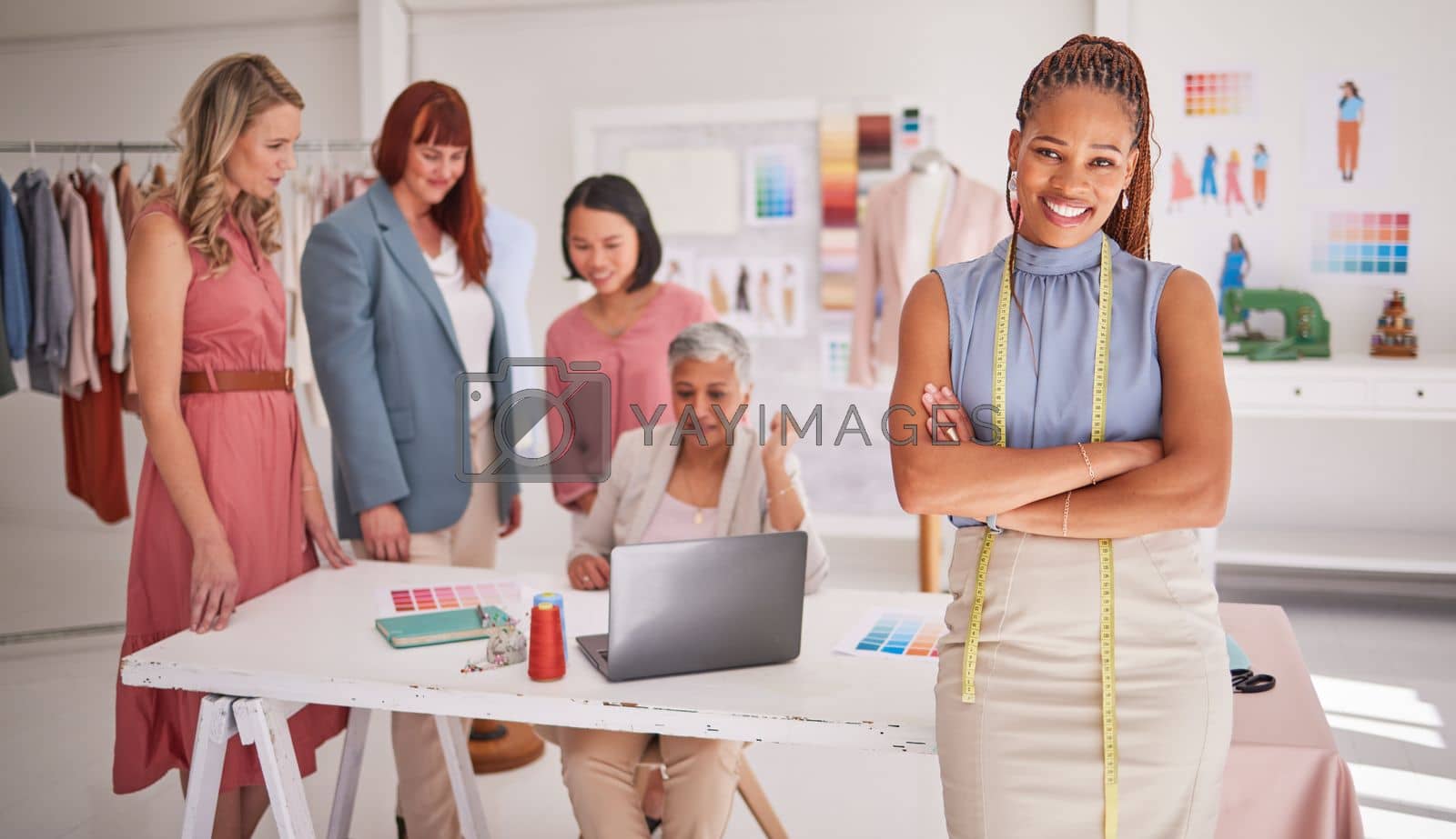 Royalty free image of Black woman, fashion designer small business team in workshop, startup and creative textile studio. Portrait of happy seamstress, dressmaker and production manager working in manufacturing company by YuriArcurs