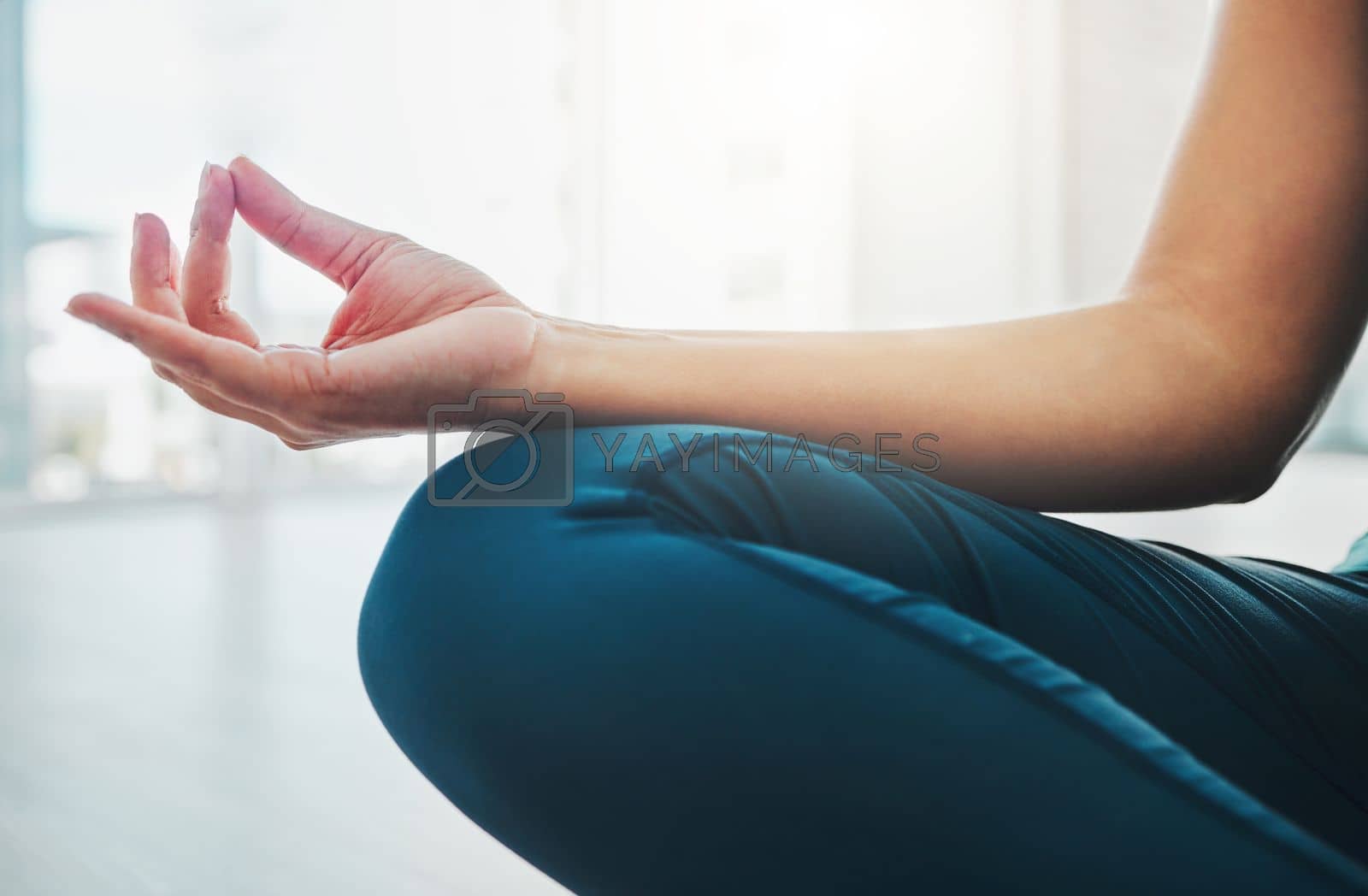 Royalty free image of Closeup, hand and woman with meditation, yoga and peace for balance, wellness and healthy lifestyle. Zoom, female yogi and lady in position, pilates training and posture to relax, fitness and calm by YuriArcurs