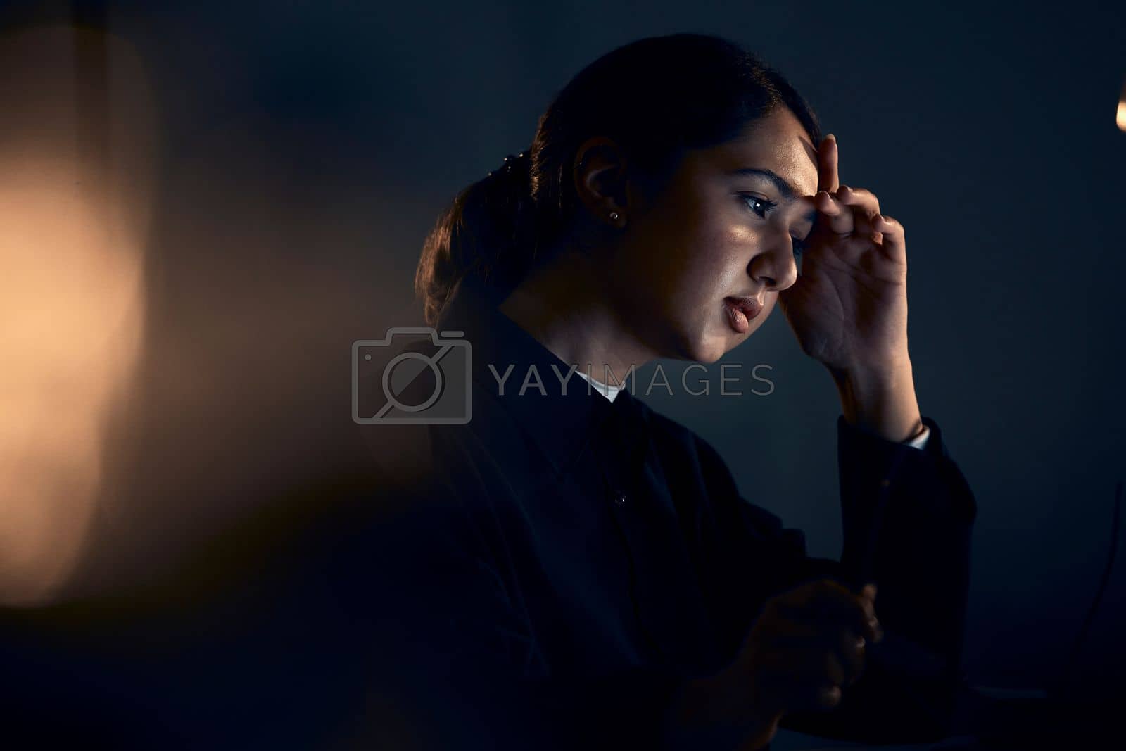 Royalty free image of Burnout, stress and business woman at night working on computer for project, report and strategy deadline. Thinking, mental health and female worker in dark office frustrated, tired and overworked by YuriArcurs