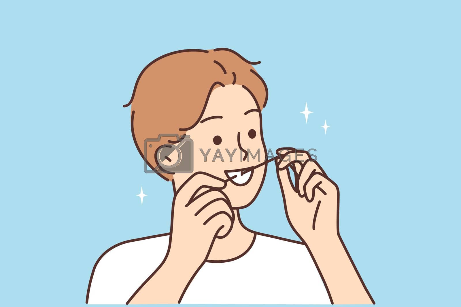 Royalty free image of Young man cleaning teeth with dental floss by Vasilyeu