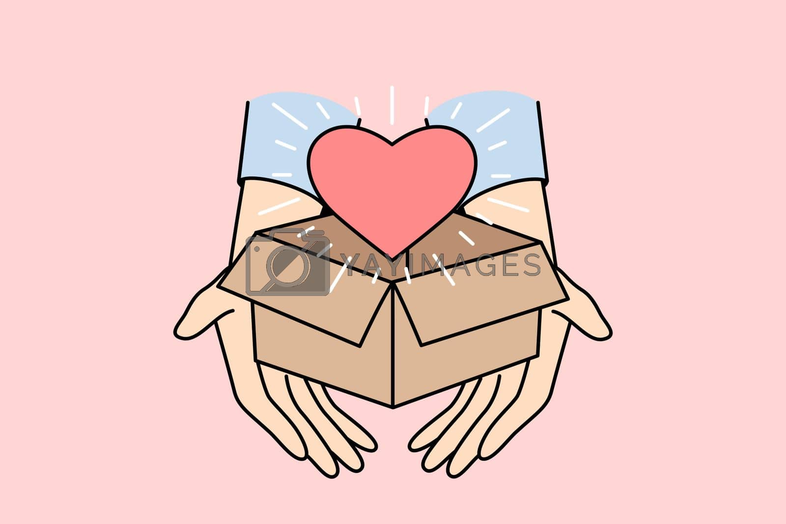 Royalty free image of Person holding box with heart by VECTORIUM