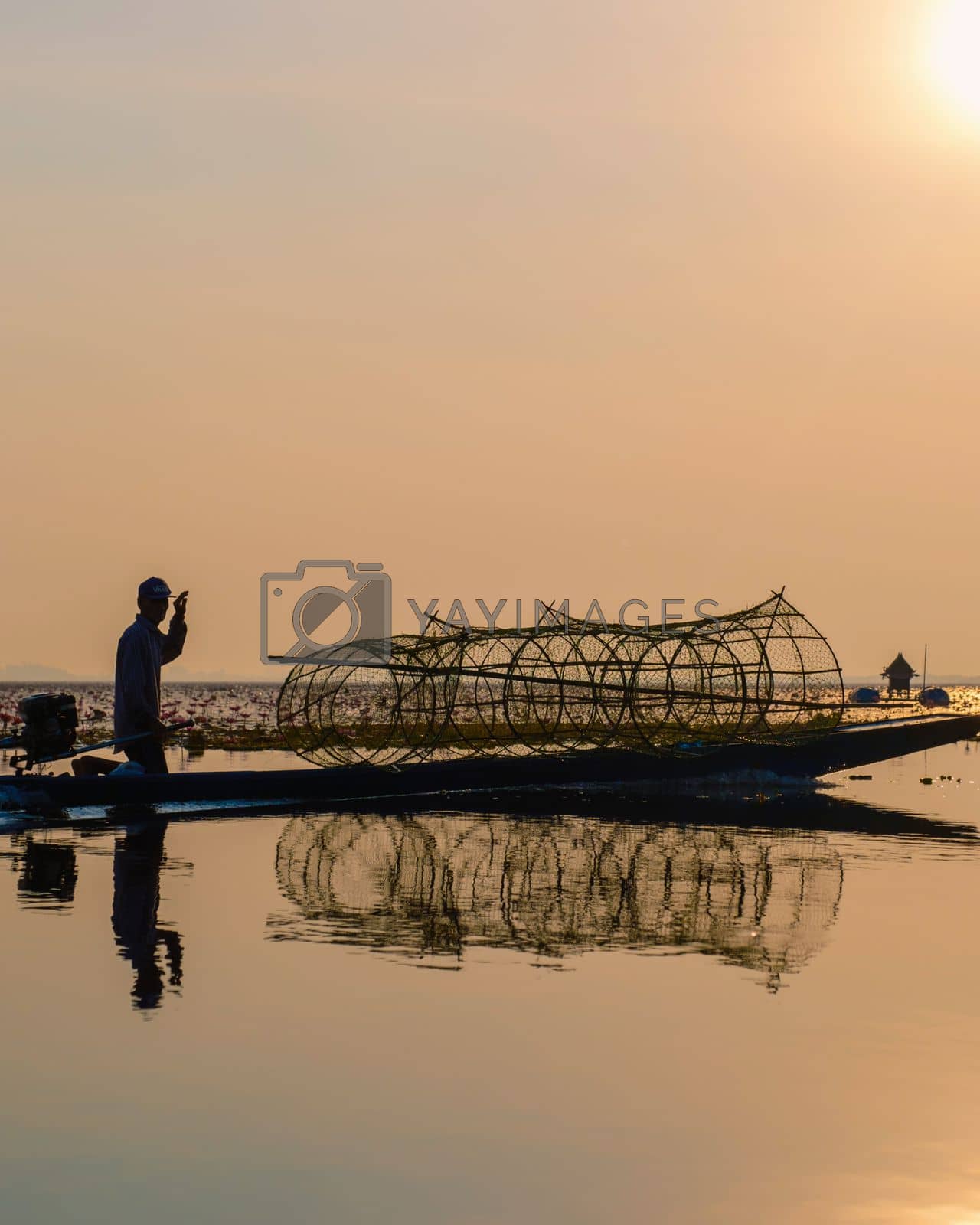 Royalty free image of Sunrise at the The sea of red lotus, Lake Nong Harn, Udon Thani, Thailand by fokkebok