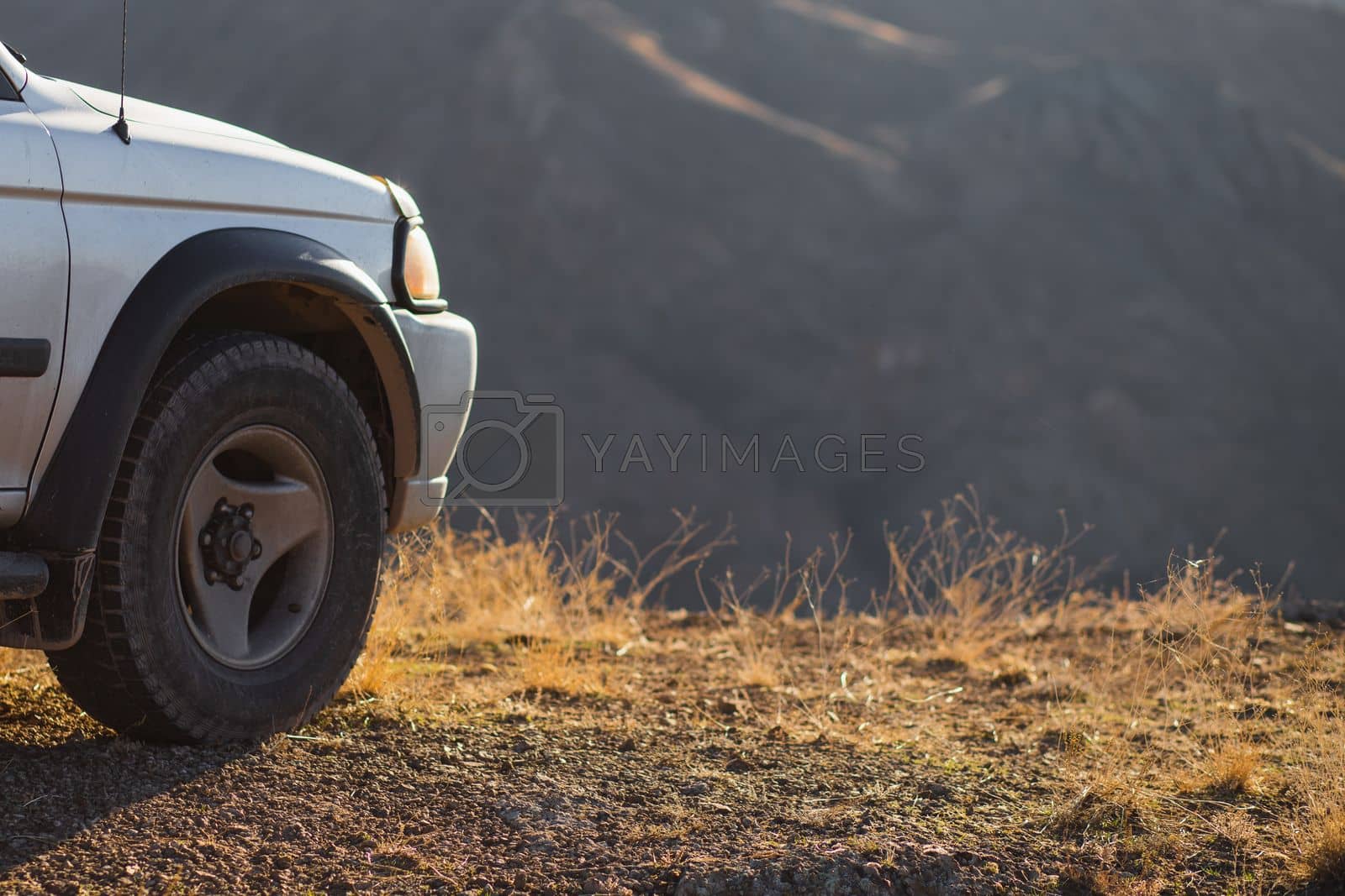 Royalty free image of Travel car concept with 4x4 SUV car in nature, copy space by Rom4ek