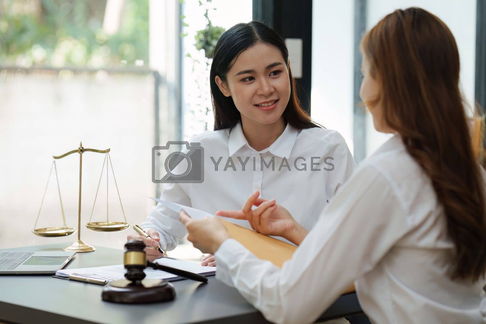 Royalty free image of Business lawyer team working together in the private meeting. Law, legal services, advice, Justice concept. by itchaznong