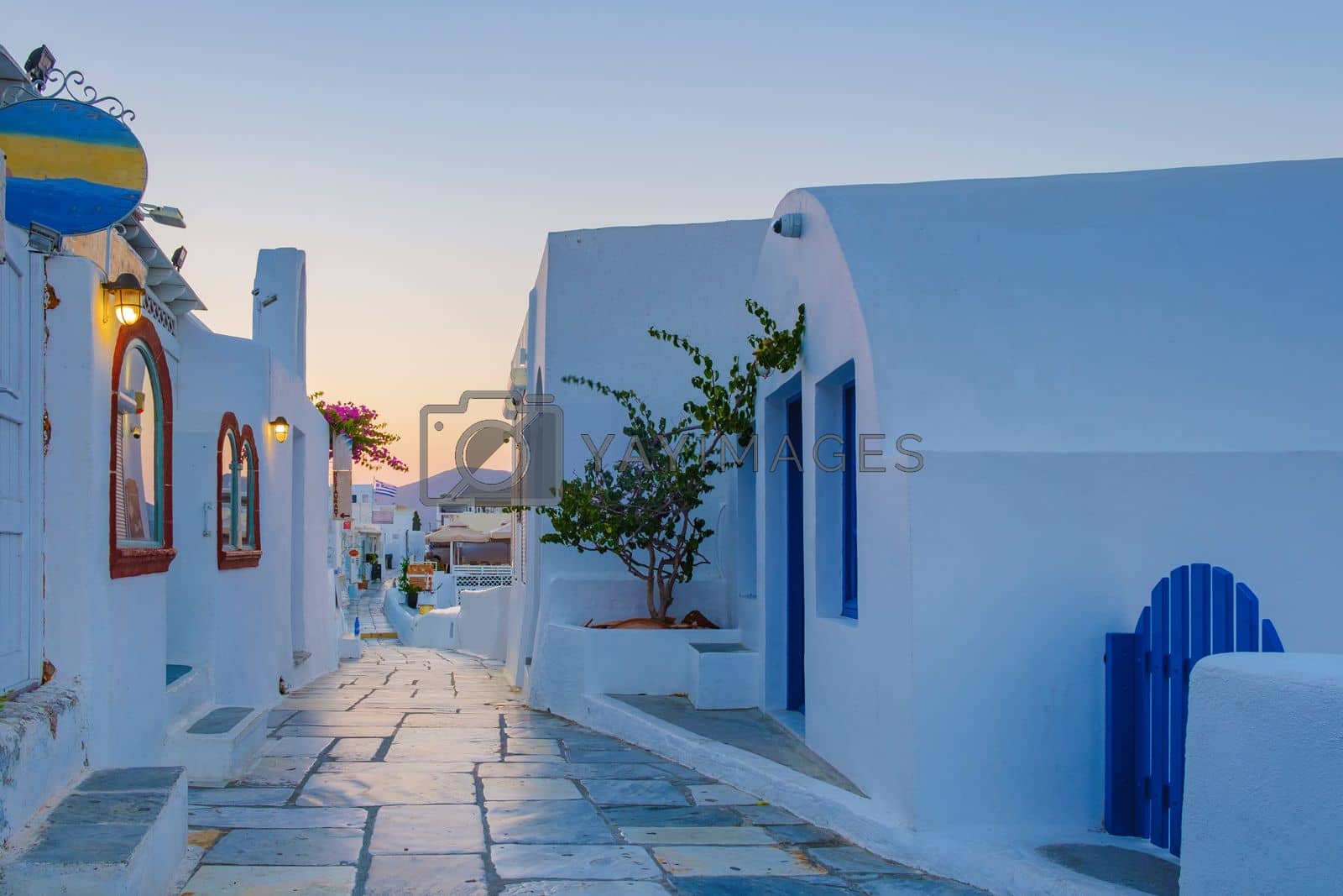 Royalty free image of sunrise by the ocean of Oia Santorini Greece, traditional Greek village by fokkebok