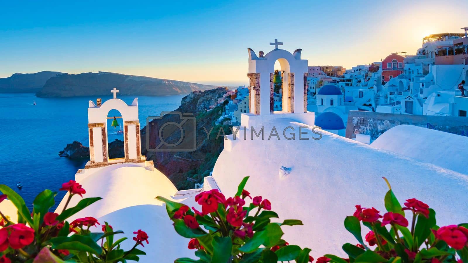 Royalty free image of sunset at Oia Santorini Greece, traditional Greek village by fokkebok