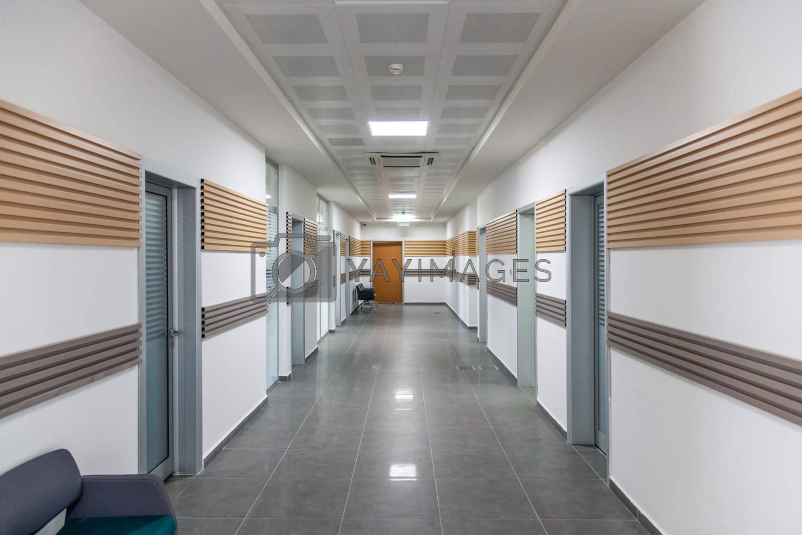 Royalty free image of Empty modern office corridor with diminished perspective and no people by Sonat