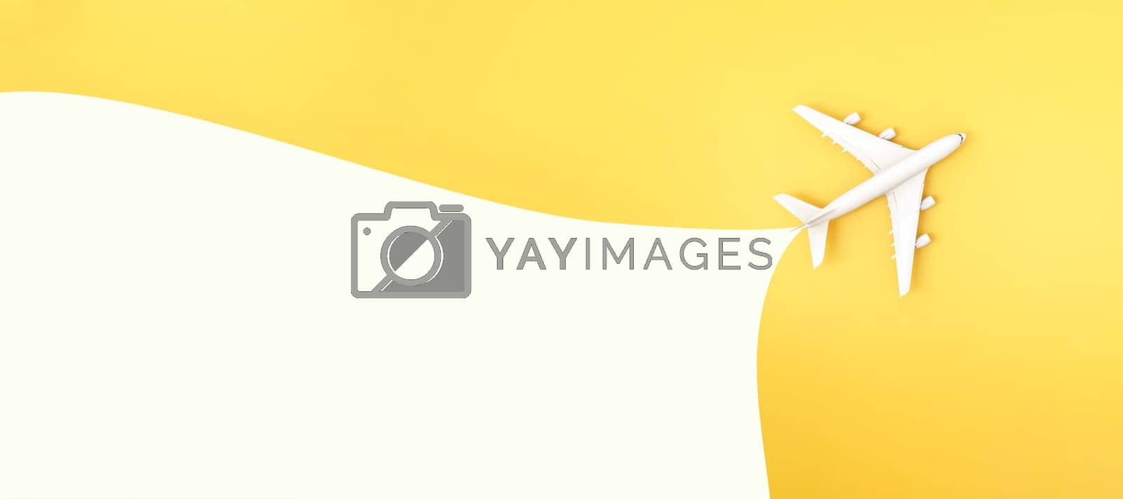 Royalty free image of Air plane on yellow background and bubble for message. Flat lay design of travel concept. by ImagesRouges