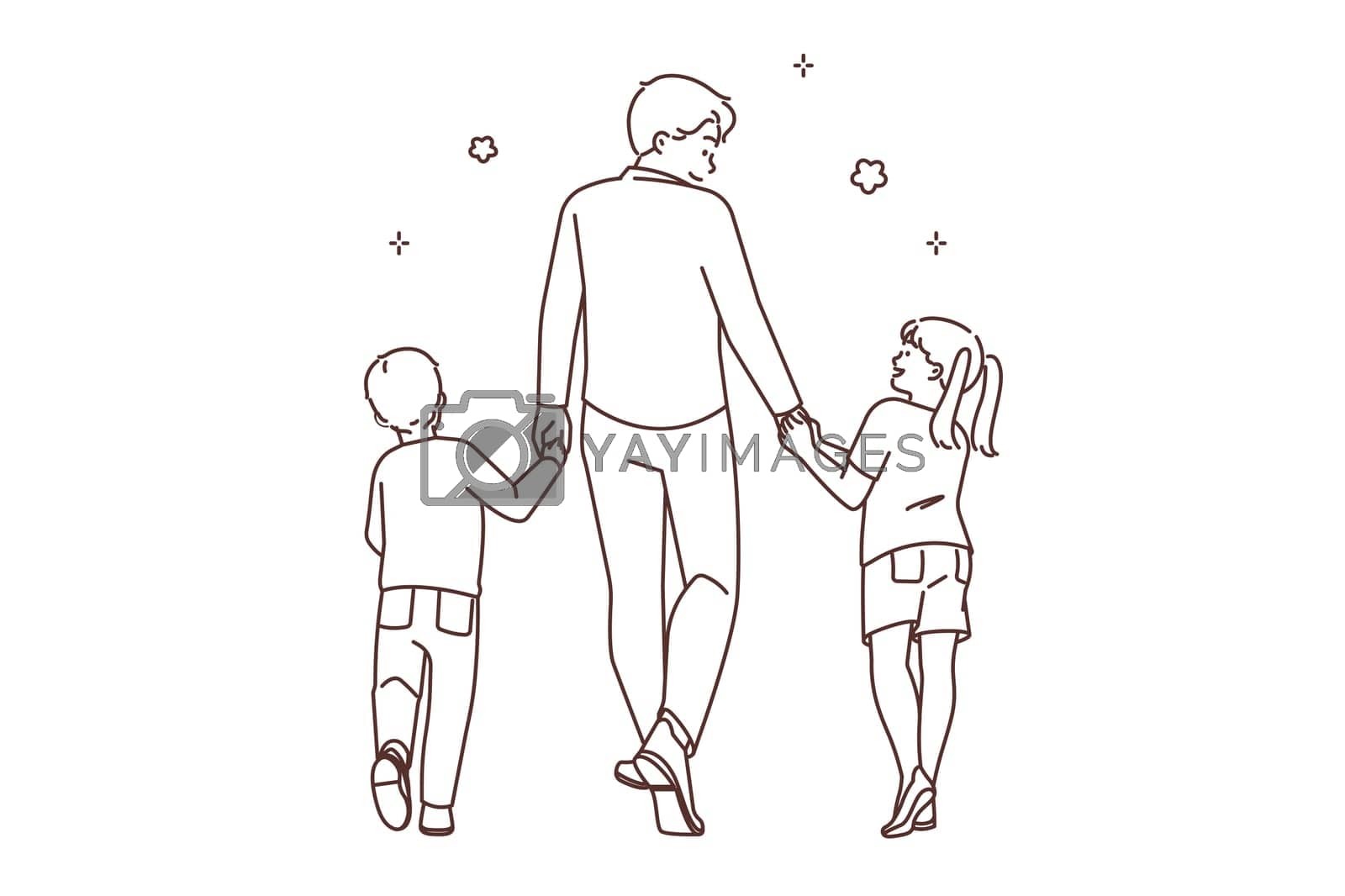 Royalty free image of Loving father walking with small children by Vasilyeu