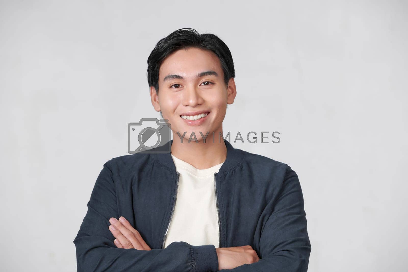 Royalty free image of Young Asian man posing on white background by makidotvn