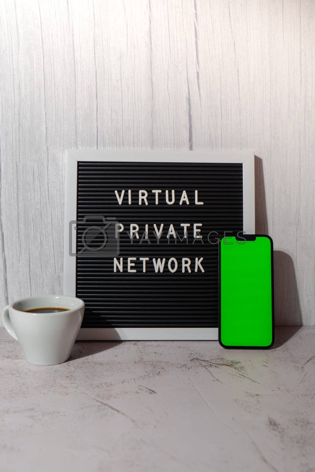 Royalty free image of Letter board with text of VIRTUAL PRIVATE NETWORK VPN with mobile phone chroma key green screen mock up template for your copy space app application creation Internet protocols for protection private network anonymous safe and secure internet access by anna_stasiia