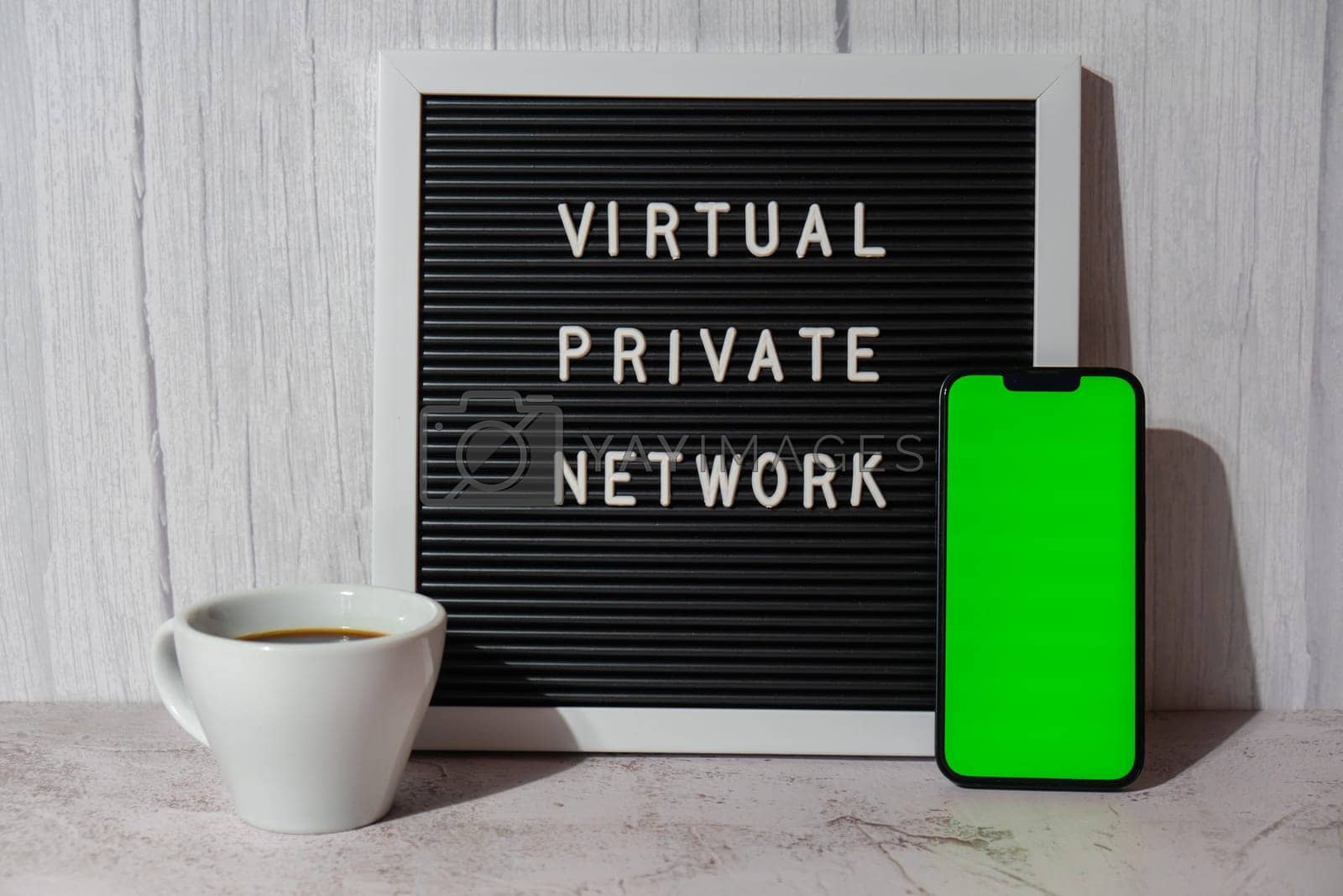Royalty free image of Letter board with text of VIRTUAL PRIVATE NETWORK VPN with mobile phone chroma key green screen mock up template for your copy space app application creation Internet protocols for protection private network anonymous safe and secure internet access by anna_stasiia