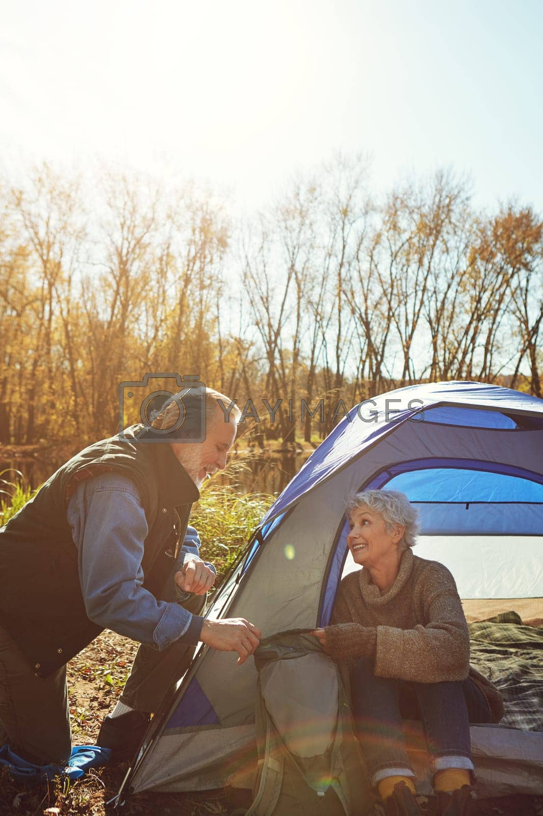 Royalty free image of Camping trips are their thing. a senior couple camping together in the wilderness. by YuriArcurs