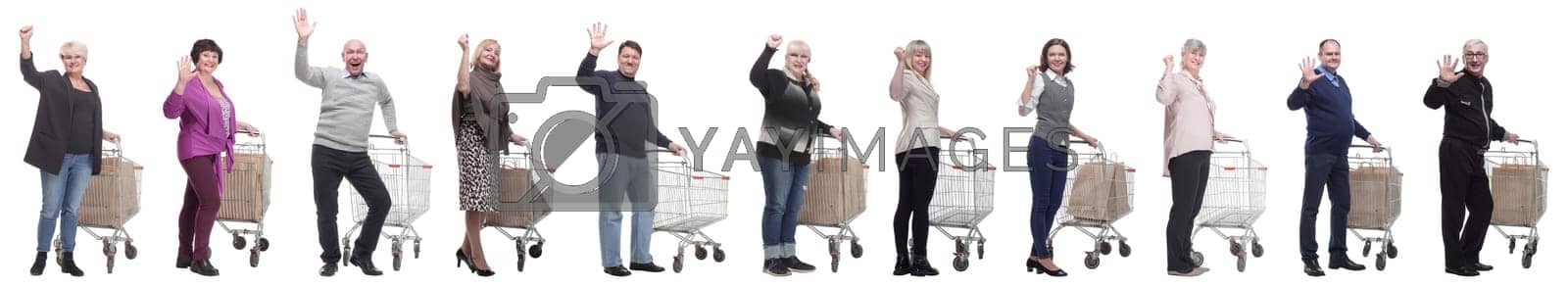 Royalty free image of group of people with trolley greet isolated on white by asdf