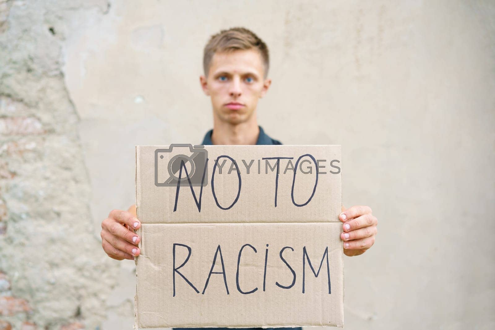 Royalty free image of Caucasian guy came out to protest against racism by EkaterinaPereslavtseva