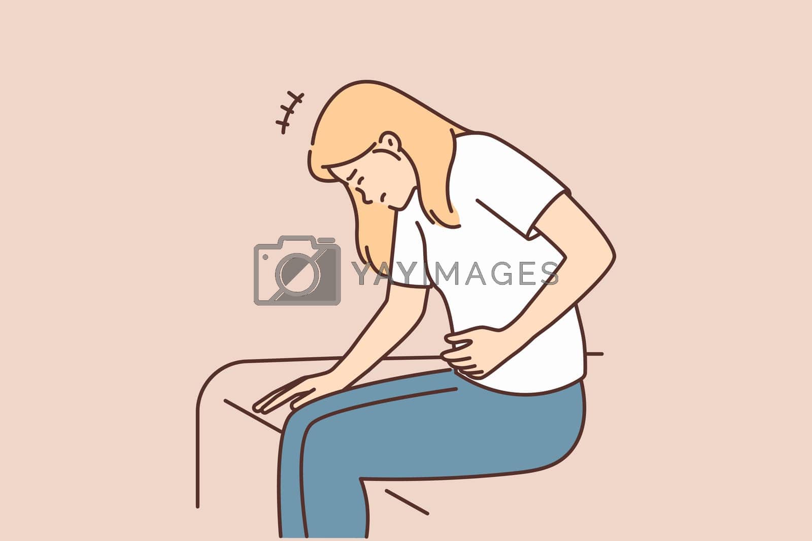 Royalty free image of Woman suffering from stomach pain sitting on bed needs medicine after food poisoning by Vasilyeu