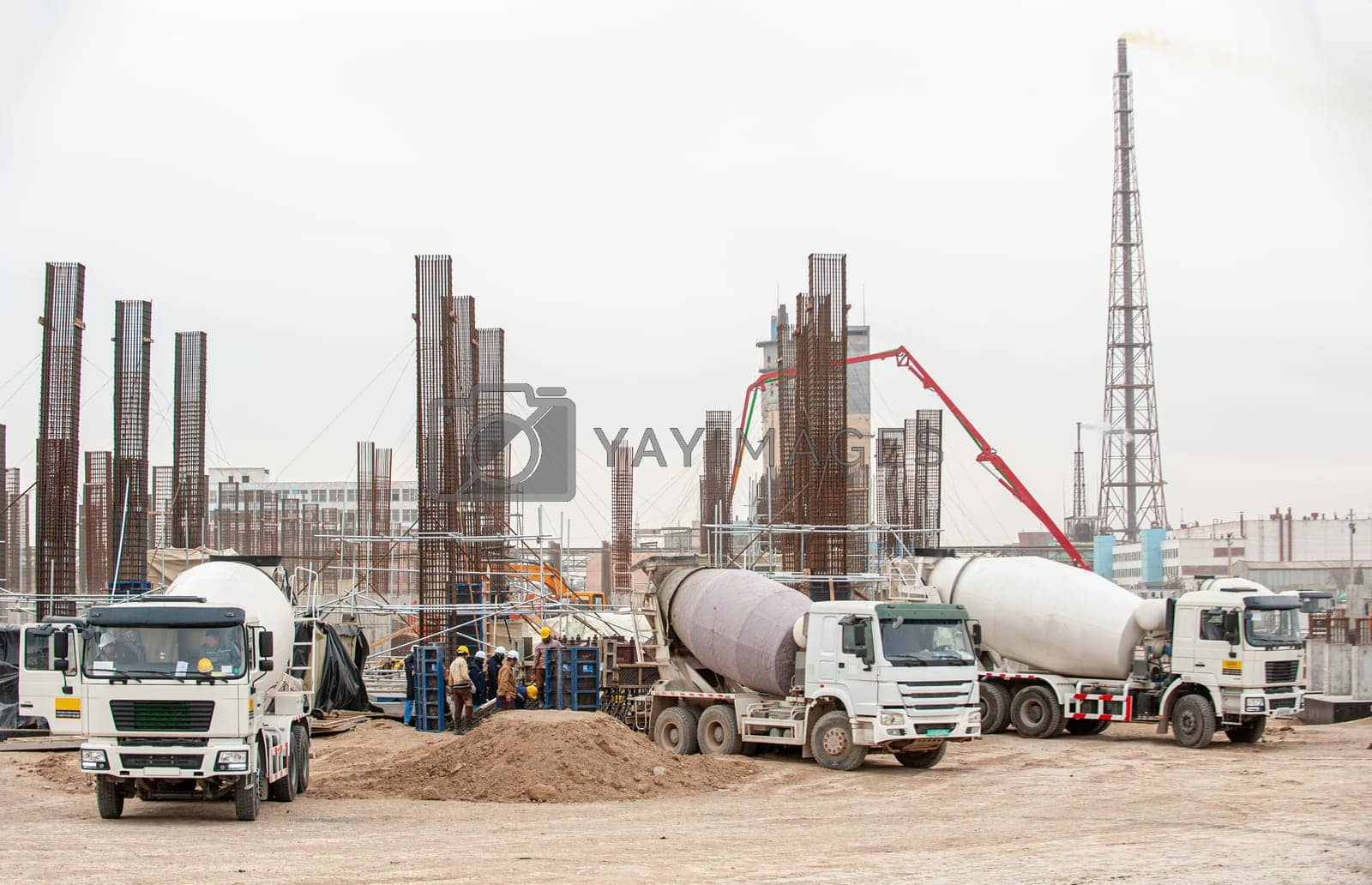 Royalty free image of An oil and gas industry with an industrial construction view with tracks and tools outdoors by A_Karim