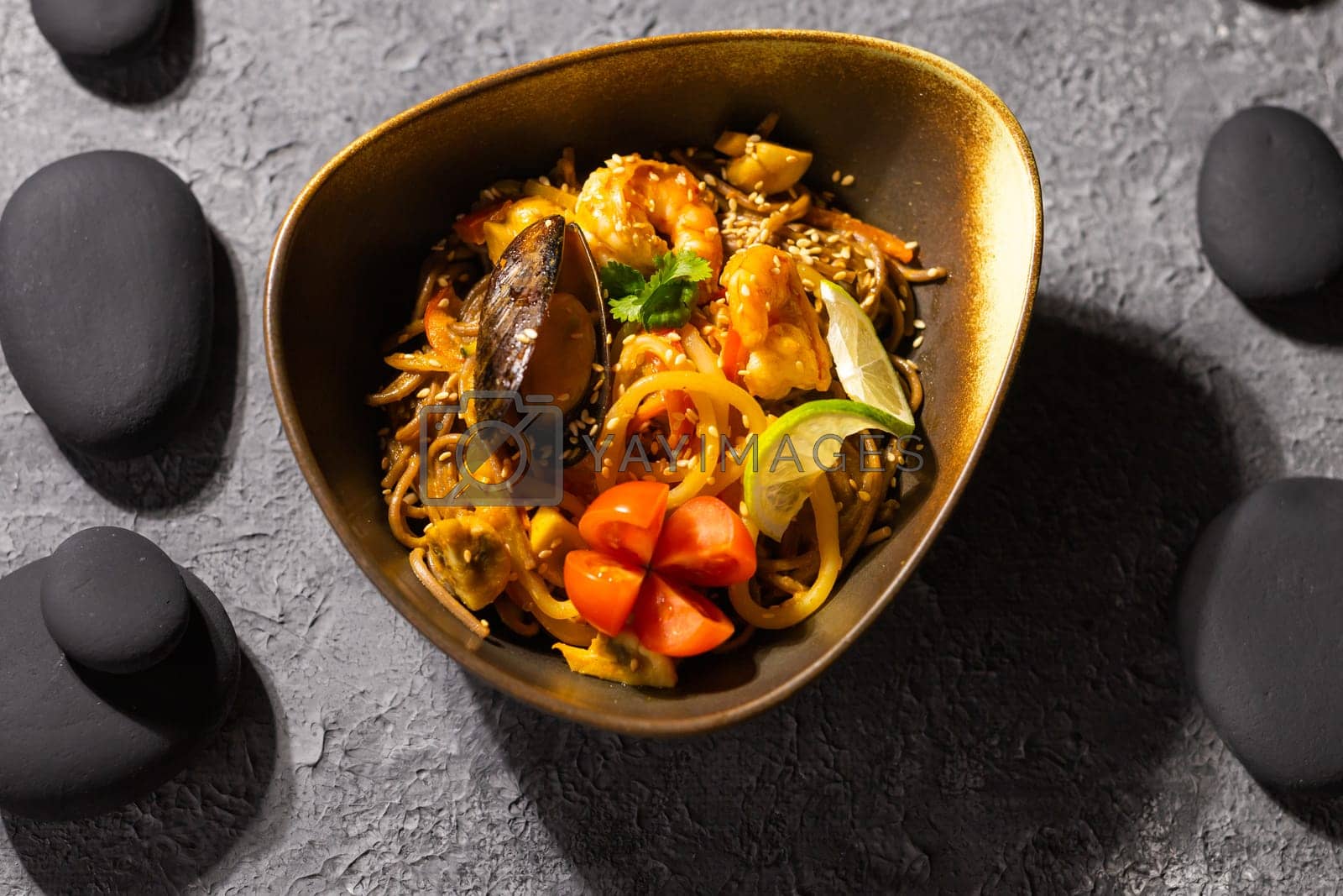 Royalty free image of Udon stir-fry noodles with mussels and shrimp. Asian cuisine by Satura86