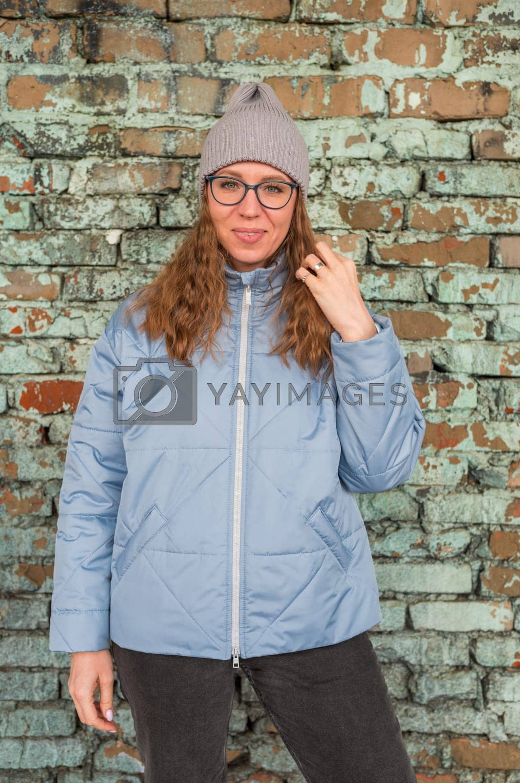 Royalty free image of Portrait of a stylish woman in blue jacket by rusak