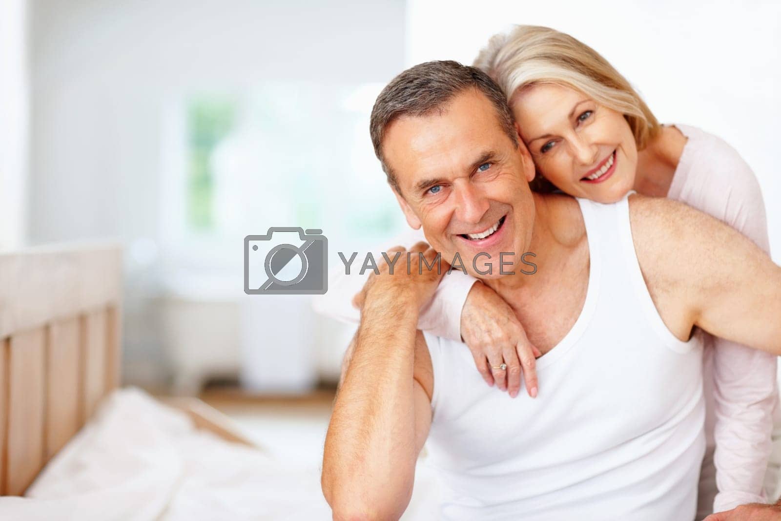 Royalty free image of Smiling mature man with wife spending time together. Portrait of a smiling mature man with wife spending time together. by YuriArcurs