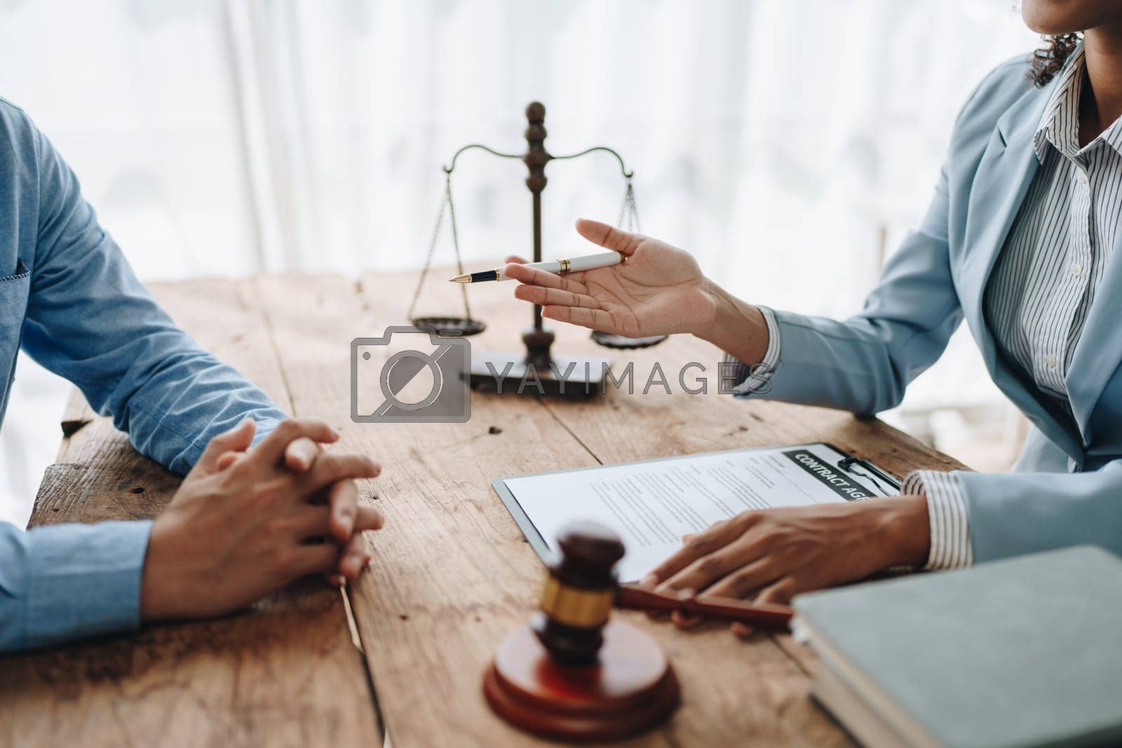 Royalty free image of african american attorney, lawyers discussing contract or business agreement at law firm office, Business people making deal document legal, justice advice service concepts by Manastrong